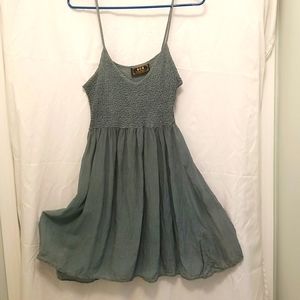 Dark sage flirty mini dress with spaghetti straps & crinkle bodice